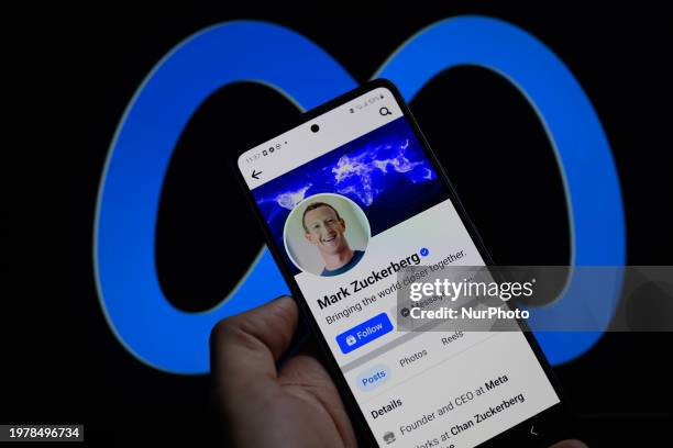 Mark Zuckerberg's Facebook page is being displayed on a smart phone with the Meta icon visible in the background, commemorating the 20th anniversary...