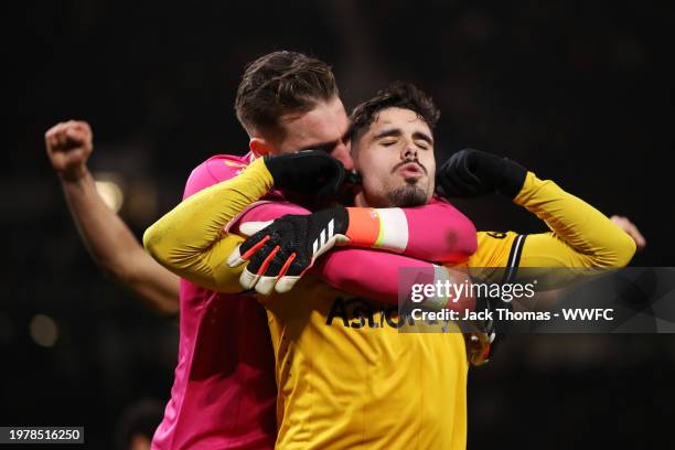 Pedro Neto of Wolverhampton Wanderers celebrates with Jose Sa of Wolverhampton Wanderers after scoring his team's third goal to equalise during the...