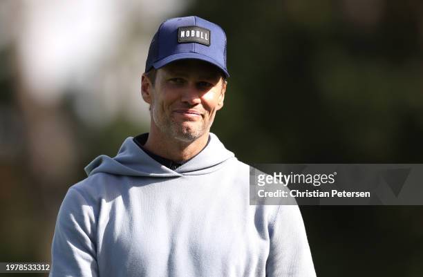 Former NFL quarterback Tom Brady looks on during the first round of the AT&T Pebble Beach Pro-Am at Pebble Beach Golf Links on February 01, 2024 in...