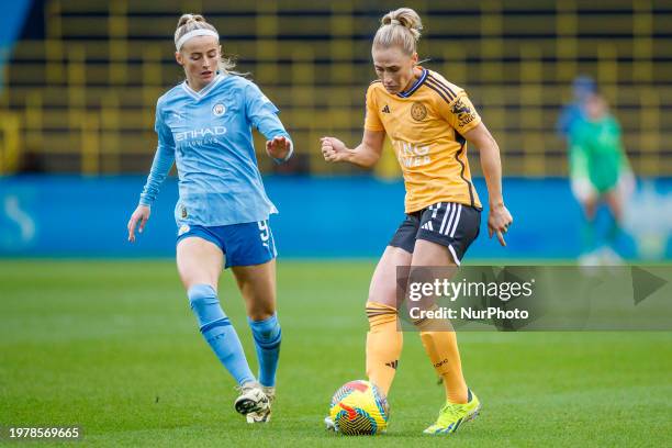 Bott of Leicester City W.F.C. Is being challenged by Chloe Kelly of Manchester City during the Barclays FA Women's Super League match between...