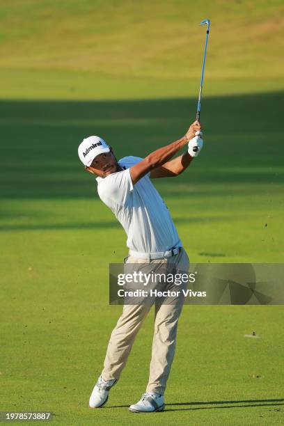 Satoshi Kodaira of Japan plays his second shot on the second hole during the first round of The Panama Championship at Club de Golf de Panama on...