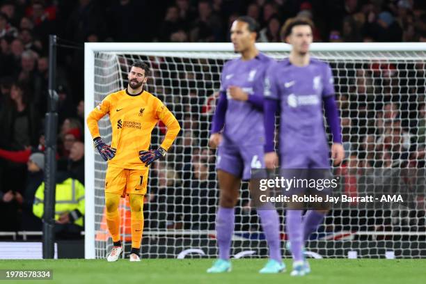 Dejected Alisson Becker of Liverpool after conceding a goal to make it 2-1 during the Premier League match between Arsenal FC and Liverpool FC at...
