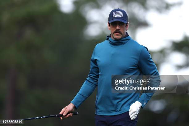 Aaron Rodgers of the NFL New York Jets looks on during the first round of the AT&T Pebble Beach Pro-Am at Spyglass Hill Golf Course on February 01,...