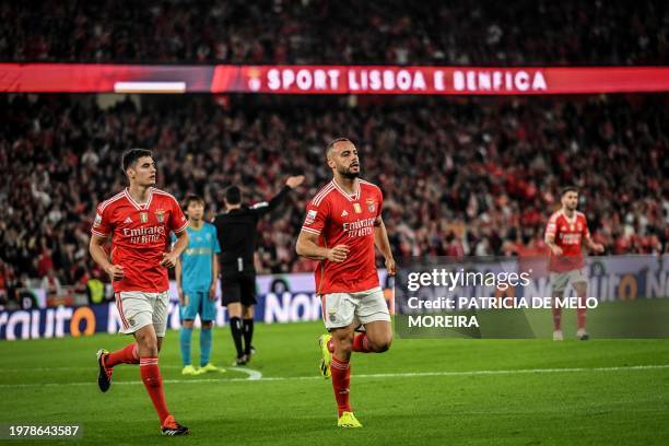 Benfica's Brazilian forward Arthur Cabral celebrates after scoring his team's first goal during the Portuguese League football match between SL...