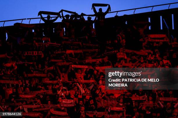 Benfica's supporters wave scarves before the start of the Portuguese League football match between SL Benfica and Gil Vicente FC at the Luz stadium...