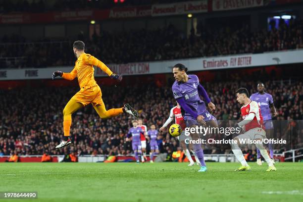 Liverpool goalkeeper Alisson Becker makes a costly goalkeeping error that leads to the 2nd Arsenal goal during the Premier League match between...