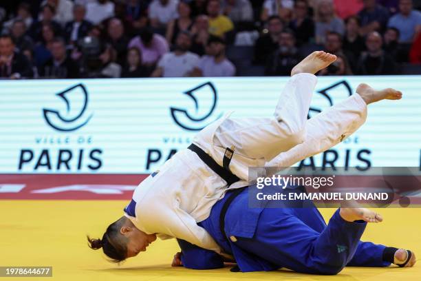 Japan's Mao Arai fights against Israel's Raz Hershko in the women's +78kg bronze medal bout during the Paris Grand Slam judo tournament in Paris on...