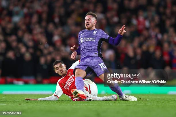 Kai Havertz of Arsenal tackles Alexis Mac Allister of Liverpool during the Premier League match between Arsenal FC and Liverpool FC at Emirates...