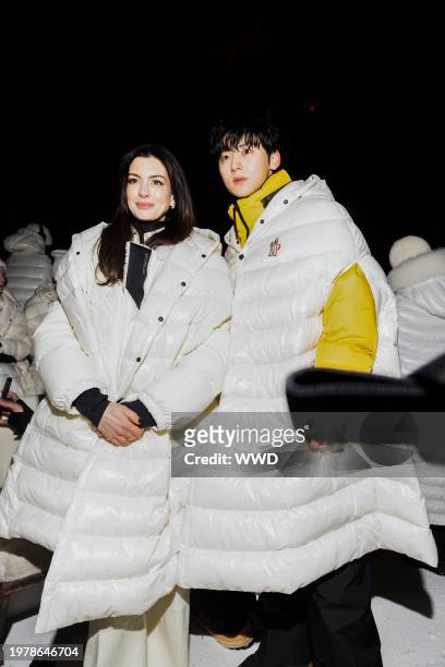 Anne Hathaway and Hwang Min-hyun in the front row at Moncler Grenoble RTW Fall 2024 held on February 3, 2024 in Saint Moritz, Switzerland.