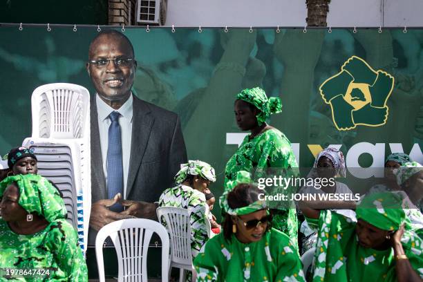 Supporters of opposition candidate Khalifa Sall gather outside his party headquarters ahead of the demonstrations called by the opposition parties in...