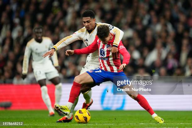 Jude Bellingham central midfield of Real Madrid and England and Rodrigo Riquelme left winger of Atletico de Madrid and Spain during the LaLiga EA...