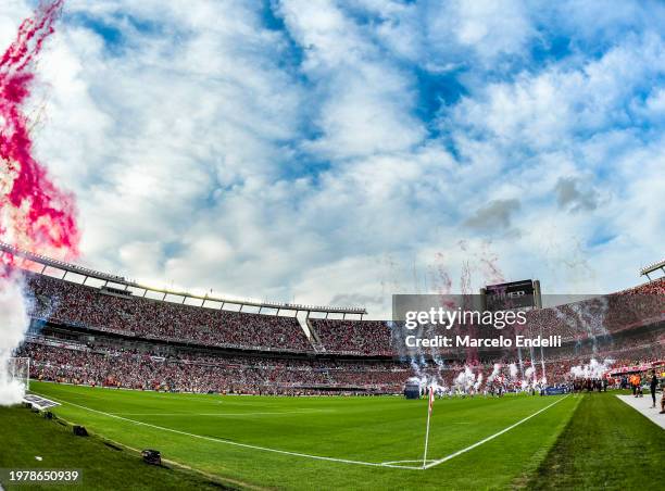 Fans of River Plate cheer for their team prior a Copa de la Liga 2024 group A match between River Plate and Velez Sarsfield at Estadio Mas Monumental...