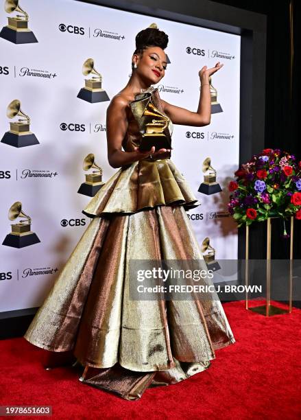 Canadian singer-songwriter Allison Russell poses in the press room with the Grammy for "Best American Roots Performance" for "Eve Was Black" during...