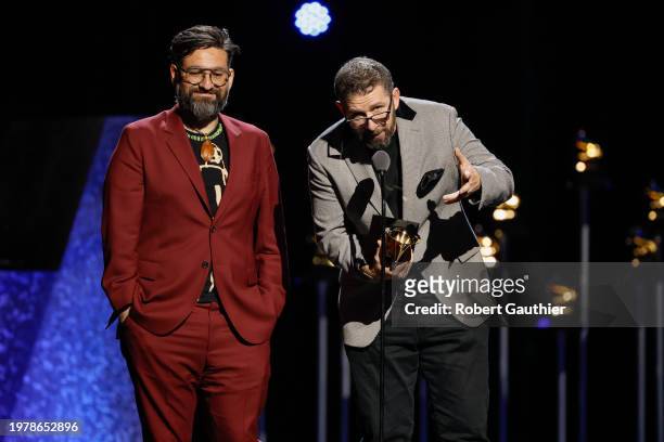 Los Angeles, CA Juanes, left, and Sebastian Krys accept the award for Latin Rock or Alternative Album at the 66th Grammy Awards Premiere Ceremony...