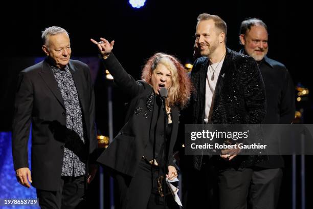 Los Angeles, CA Janet Robin and the rest of The String Revolution, and Tommy Emmanuel, accept the award for Arrangement, Instrumental or A Cappella...