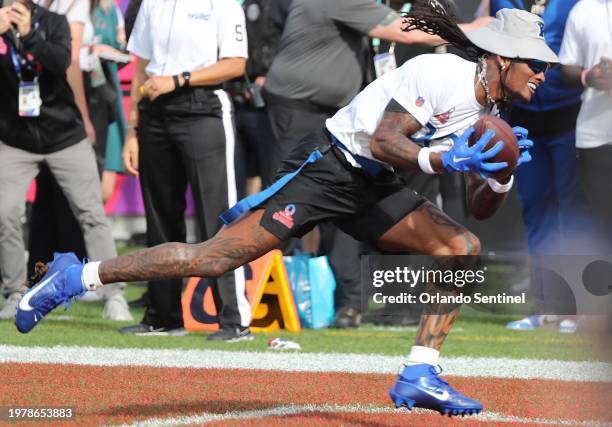 Dallas Cowboys wide receiver CeeDee Lamb hauls in a catch in the end zone during the NFL Pro Bowl game at Camping World Stadium in Orlando, Florida,...