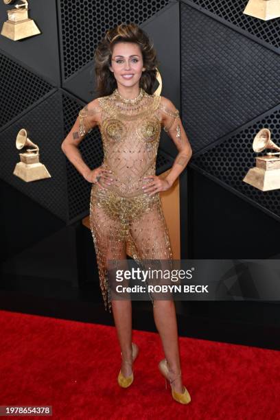 Singer-songwriter Miley Cyrus arrives for the 66th Annual Grammy Awards at the Crypto.com Arena in Los Angeles on February 4, 2024.