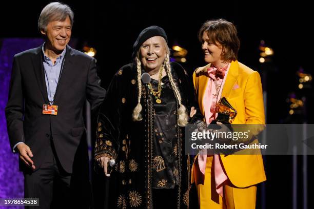 Los Angeles, CA Joni Mitchell accepts the award for Folk Album at the 66th Grammy Awards Premiere Ceremony held at the Peacock Theater in Los...
