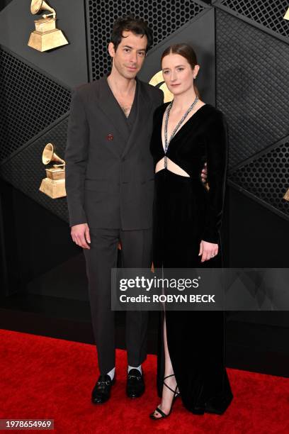 British musician Mark Ronson and US actress Grace Gummer arrive for the 66th Annual Grammy Awards at the Crypto.com Arena in Los Angeles on February...