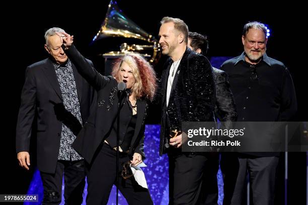 John Carter Cash, Janet Robin, Tommy Emmanuel, Markus Illko, and Rober Luis Gomez accept the "Best Arrangement, Instrumental or A Cappella" award for...