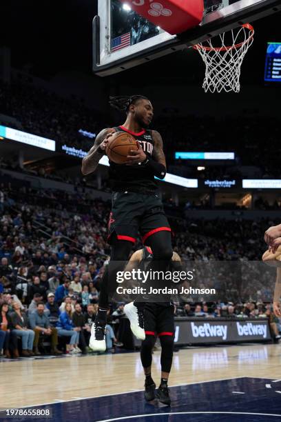 Cam Whitmore of the Houston Rockets grabs a rebound during the game against the Minnesota Timberwolves on February 4, 2024 at Target Center in...