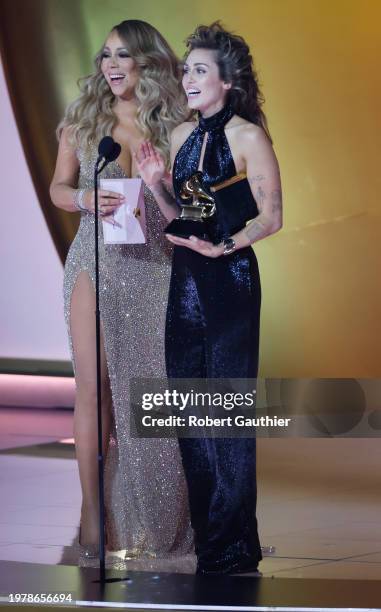 Los Angeles, CA Miley Cyrus and Mariah Carey at the 66th Grammy Awards held at the Crypto.com Arena in Los Angeles, CA, Sunday, Feb. 4, 2024.