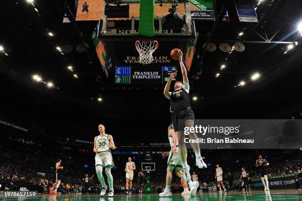 Matt Hurt of the Memphis Grizzlies drives to the basket during the game against the Boston Celtics on February 4, 2024 at the TD Garden in Boston,...