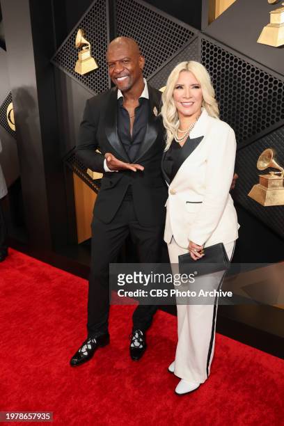 Terry Crews and Rebecca King-Crews arrive at The 66th Annual Grammy Awards, airing live from Crypto.com Arena in Los Angeles, California, Sunday,...
