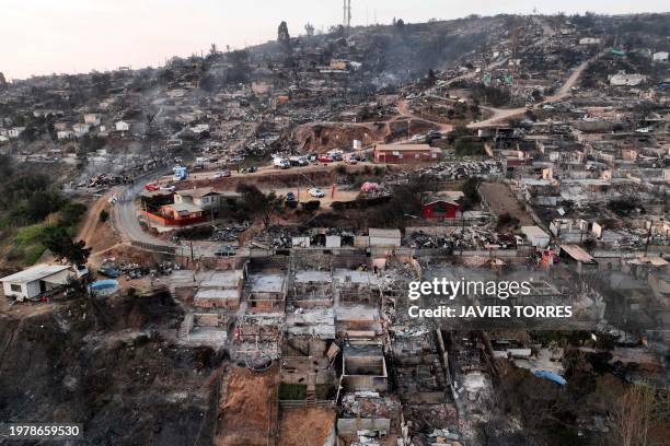 Aerial view of the aftermath of a wildfire in Villa Independencia, Valparaiso region, Chile on February 4, 2024. The death toll from the forest fires...