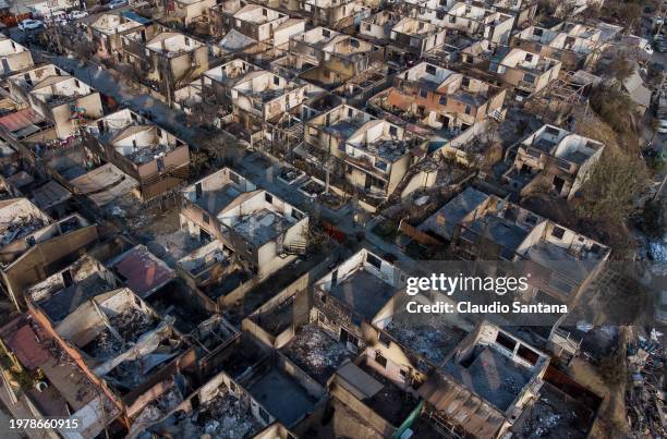 Aerial view of destroyed houses at Villa El Olivar after the forest fires on February 4, 2024 in Vina del Mar, Chile. President Gabriel Boric...
