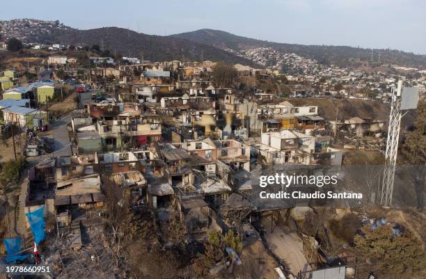 Aerial view of destroyed houses at Villa El Olivar after the forest fires on February 4, 2024 in Vina del Mar, Chile. President Gabriel Boric...