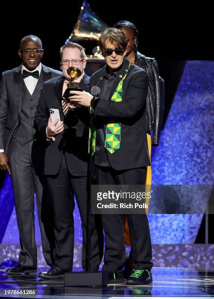 Antaeus and Julian Marley accept the "Best Reggae Album" award for "Colors of Royal" at the 66th Annual GRAMMY Awards Premiere Ceremony held at...