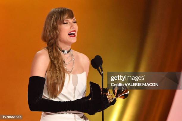 Singer-songwriter Taylor Swift accepts the Best Pop Vocal Album award for "Midnights" on stage during the 66th Annual Grammy Awards at the Crypto.com...