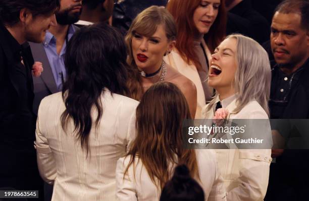 Los Angeles, CA Taylor Swift talks with Julien Baker, Phoebe Bridgers and Lucy Dacus of boygenius at the 66th Grammy Awards held at the Crypto.com...