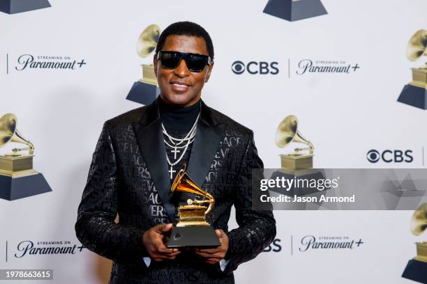 Los Angeles, CA Winner Kenneth "Babyface" Edmonds poses in the press room with the Grammy for Best R&B Song award for "Snooze," with trophy, at the...