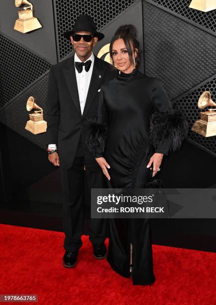 Songwriter Jimmy Jam and his wife Lisa Padilla arrive for the 66th Annual Grammy Awards at the Crypto.com Arena in Los Angeles on February 4, 2024.