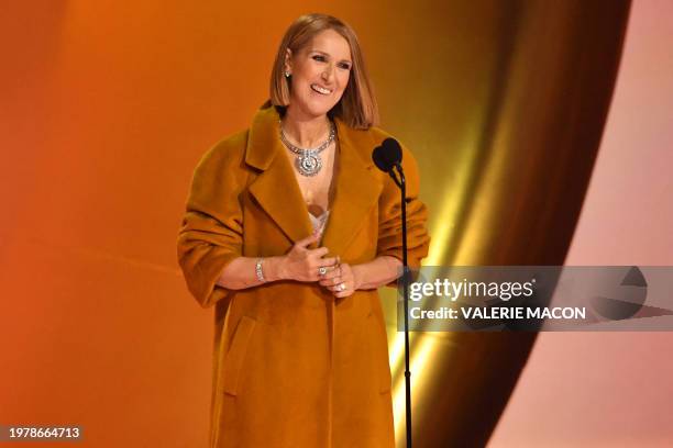 Canadian singer Celine Dion presents the Album Of The Year award on stage during the 66th Annual Grammy Awards at the Crypto.com Arena in Los Angeles...