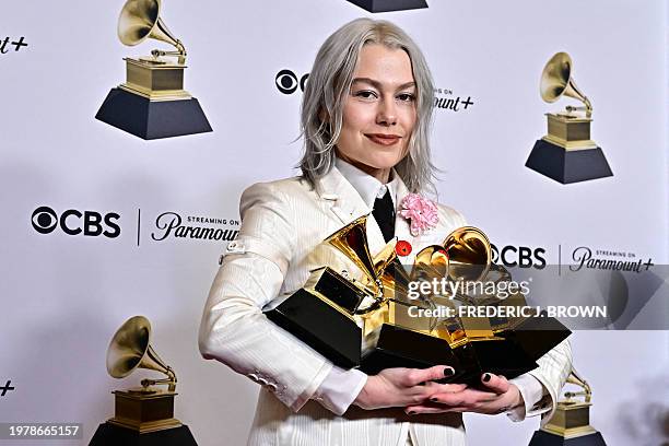 Singer-songwriter Phoebe Bridgers poses in the press room with the Grammy Awards for Best Alternative Music Album for "The Record", Best Rock Song...