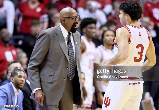 Mike Woodson the head coach gives instructions to Anthony Leal of the Indiana Hoosiers in the second half of the 74-68 win over the Iowa Hawkeyes at...