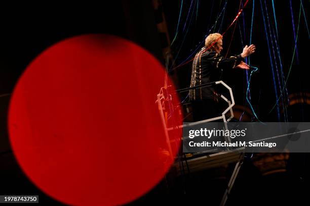 High-wire walker Philippe Petit walks a high wire through the ribbons of Divine Pathways at the Cathedral of St. John the Divine on February 01, 2024...