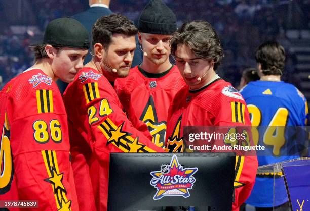Jack Hughes, Michael Buble, Elias Pettersson and Quinn Hughes participate in the Tim Horton's NHL All-Star Player Draft at Scotiabank Arena on...
