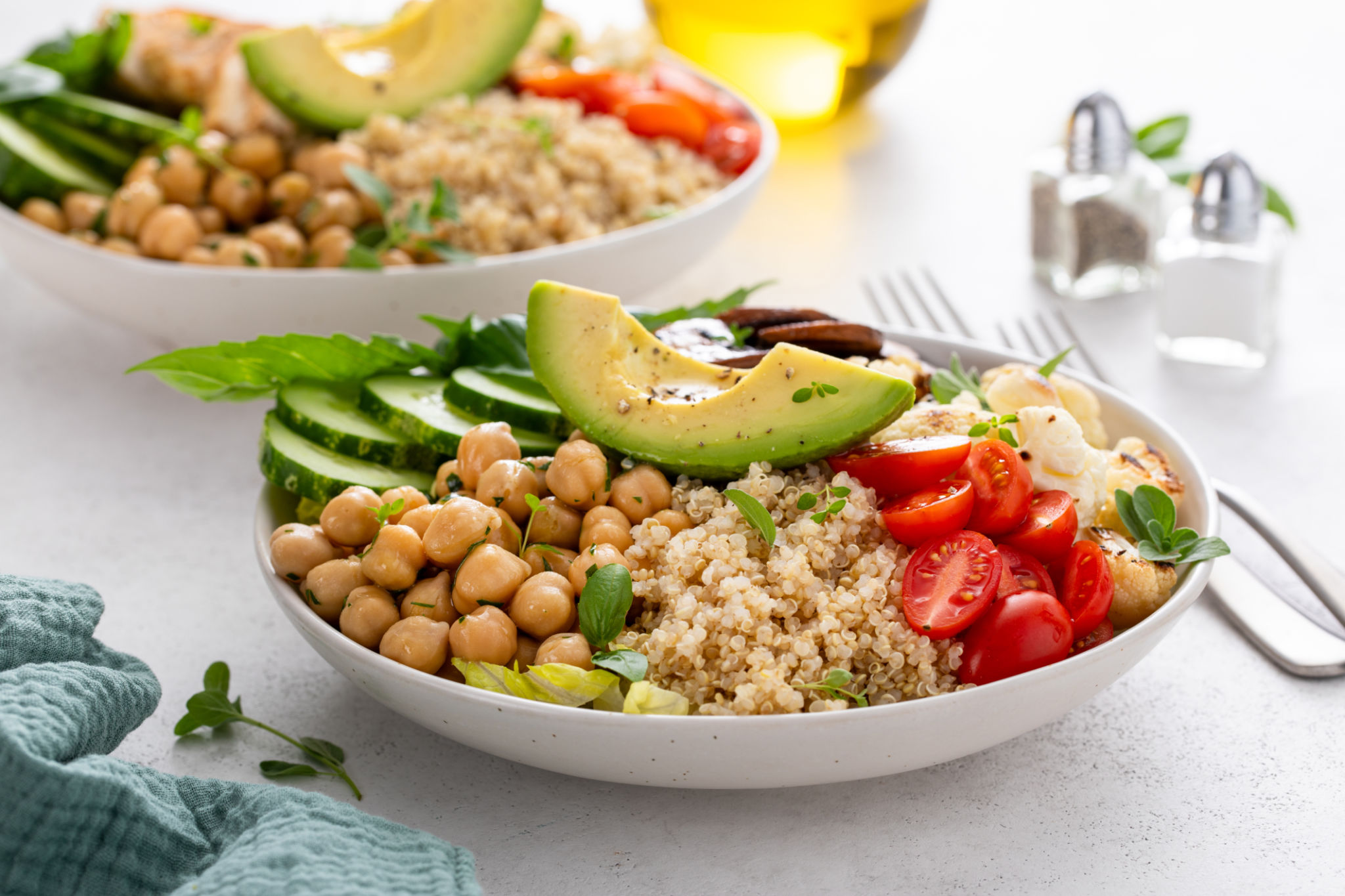 Healthy high protein vegan plant based lunch bowl with mushrooms, roasted cauliflower, chickpeas and quinoa Healthy high protein vegan plant based lunch bowl with mushrooms, roasted cauliflower, chickpeas and quinoa