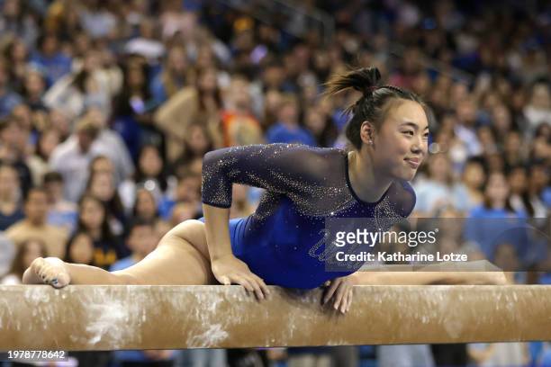 Emily Lee of the UCLA Bruins competes on balance beam during a meet against the Washington Huskies at Pauley Pavilion on January 27, 2024 in Los...