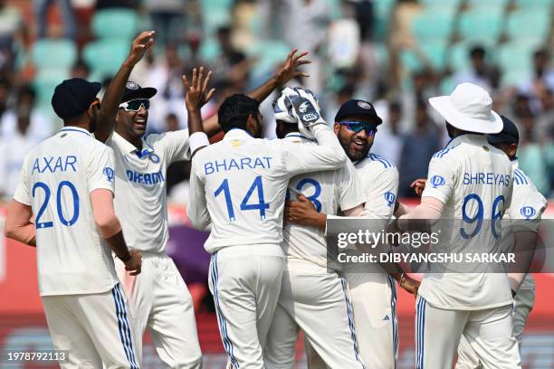 India's Jasprit Bumrah celebrates with teammates after taking the wicket of England's Ben Foakes during the fourth day of the second Test cricket...