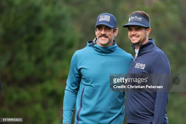 Aaron Rodgers of the NFL New York Jets, left, and Beau Hossler of the United States pose for a photograph during the first round of the AT&T Pebble...