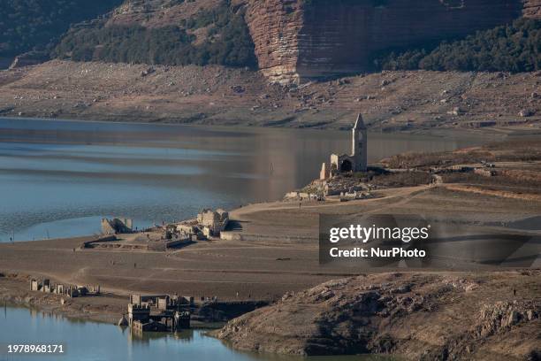 Hundreds of people are visiting the old town of Sant Roma de Sau, where normally the water of the Sau reservoir would almost completely cover the...