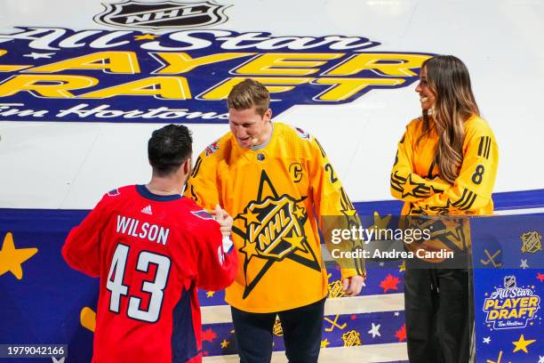 Tom Wilson of the Washington Capitals greets Nathan MacKinnon of the Colorado Avalanche after being drafted in the Tim Horton's NHL All-Star Player...