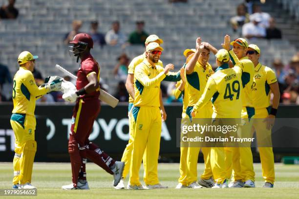 Xavier Bartlett of Australia celebrates the wicket of Justin Greaves of the West Indiesduring game one of the One Day International series between...