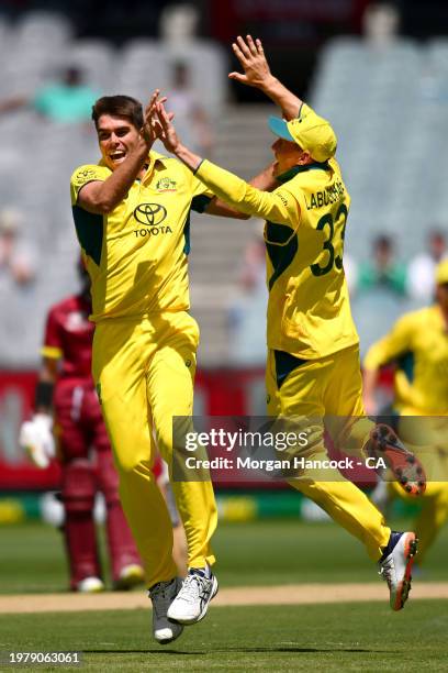 Xavier Bartlett of Australia celebrates the wicket of during game one of the One Day International series between Australia and West Indies at...