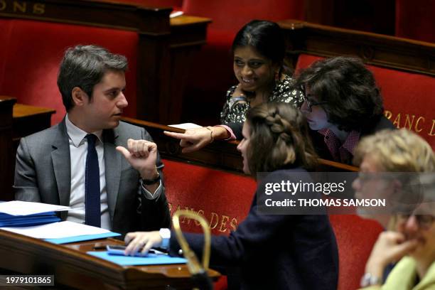 French Prime Minister Gabriel Attal reacts as he talks with French Culture Minister Rachida Dati during a session at the National Assembly in Paris,...